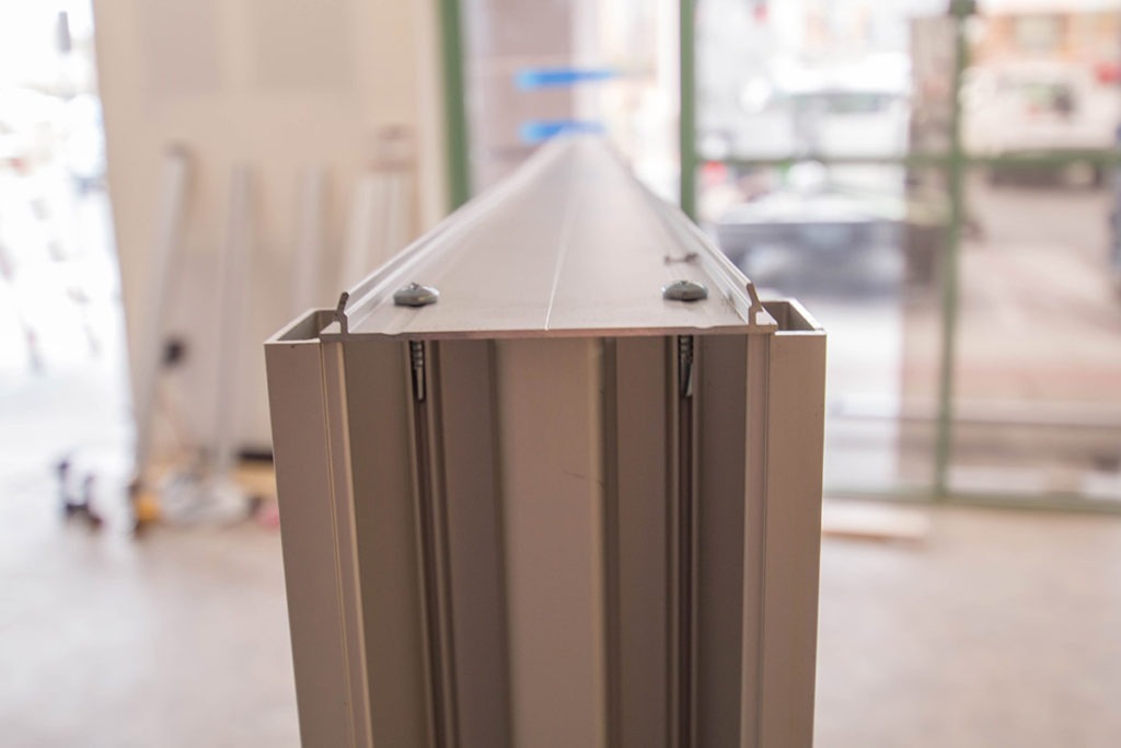 Close-up Of Commercial Glass Store 1 3/4" by 4 1/2" Aluminum Frame