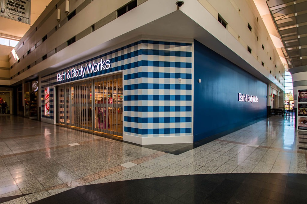 A Cutting Edge Glass and Mirror - Metal Storefront Cladding Systems