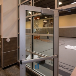 Close-up of Storefront Door System and Transom Windows at 24 Hour Fitness