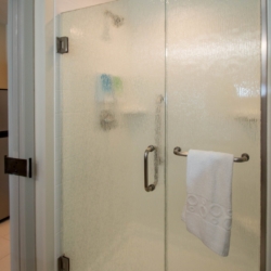 Home to Suites Shower Door Enclosure System by A Cutting Edge Glass and Mirror