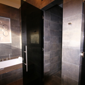 Frameless Shower Door Enclosure System by A Cutting Edge Glass and Mirror of Las Vegas, Nevada