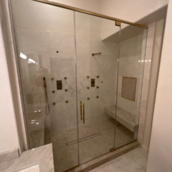 38” clear tempered glass satin brass hardware