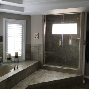 3/8 clear tempered glass; satin brass hardware